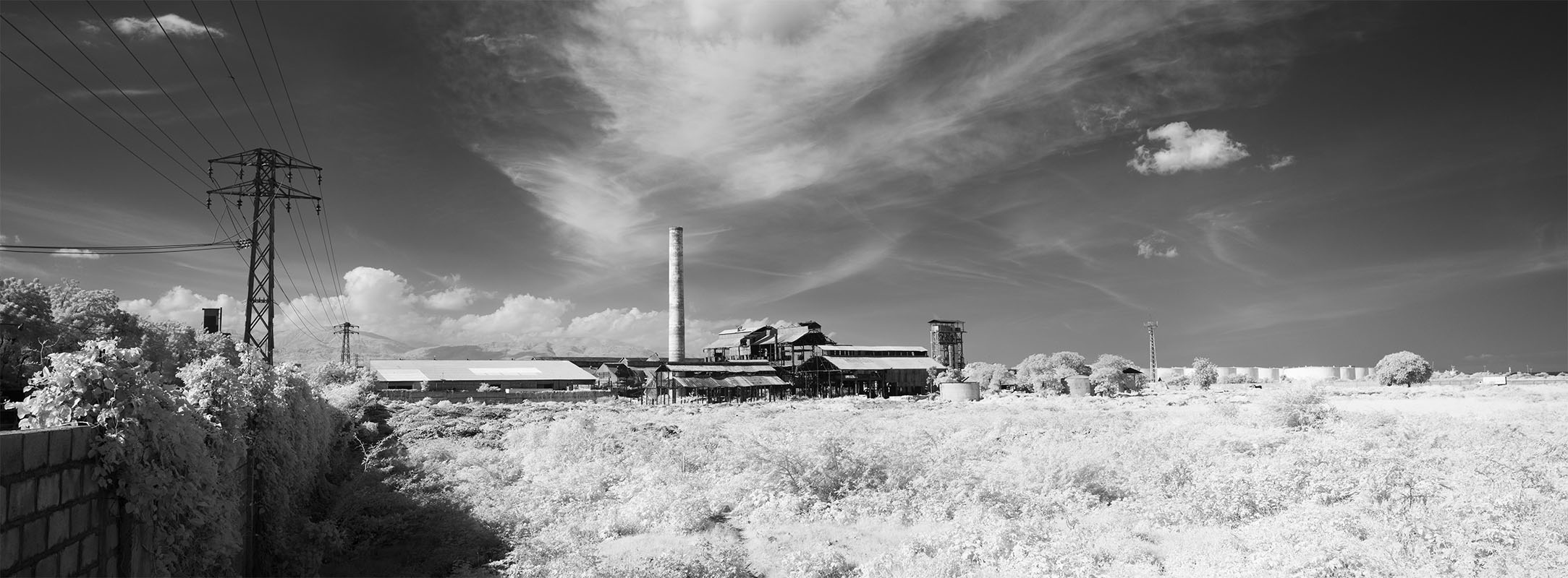 Infrared Panorama, Abandoned Field and Derelict Sugar Mill in Port-au-Prince, Haiti.